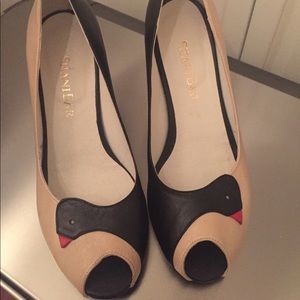 Stunning leather heels featuring swan design